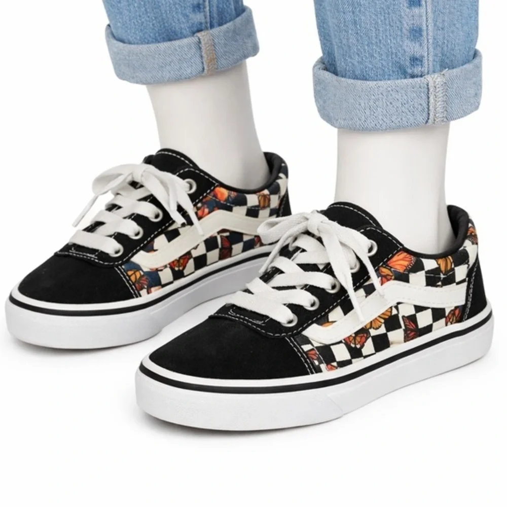 Vans Black and White Low-Top Slip-On Sneakers